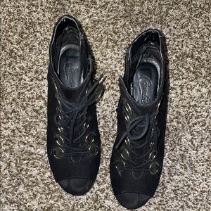 Worn lace up heel booties